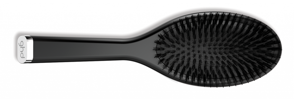 Oval dressing brush